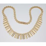 A 9ct gold "Rolex" link fringe necklace, hallmarked 9ct gold, sponsor 'NK', London 1979, length 39.