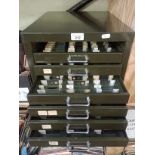 A microscope slide cabinet containing approximately 230 slides including some 19th century examples.