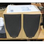 A pair of Mission M70 speakers.