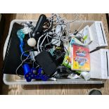 A box of various computer consoles, games, accessories, PS3, Wii, etc.