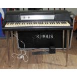 A Wurlitzer 200A electric piano, with pedal, and flight case, previously owned/used by Dire Straits