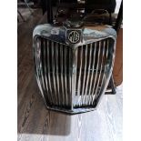 A vintage chromed radiator grill for an MG, possibly Magnette ZB model, complete with enamel black