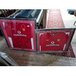 2 signed Manchester United f.c. shirts, framed and glazed.