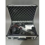 A Tamashi camera with accessories in hard case.