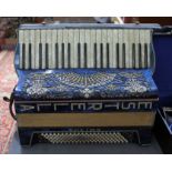 An Estrella Artists Super Four model piano accordion.