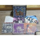 A case containing approx. 30 LPs including Jimi HEndrix, The Rolling Stones etc.