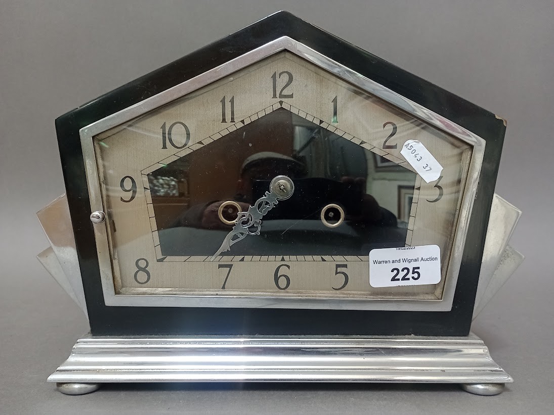 An Art Deco chrome mantel clock.