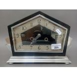 An Art Deco chrome mantel clock.