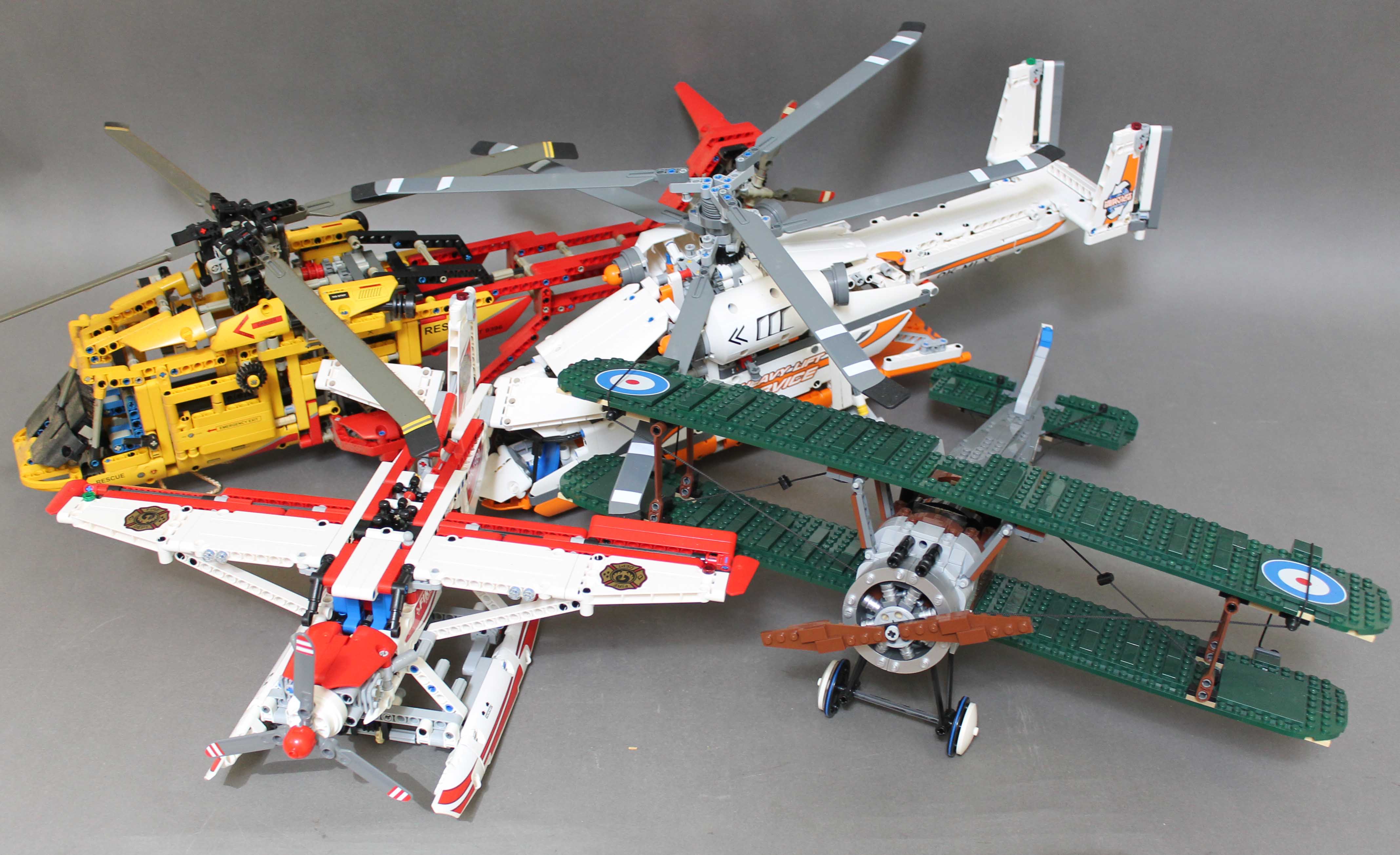 A group of four Lego and Lego Technic model aircraft