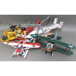 A group of four Lego and Lego Technic model aircraft