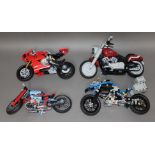 A group of four Lego and Lego Technic motorbikes.