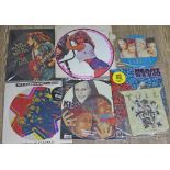 Seven assorted picture/coloured discs.