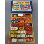 A Matchbox carry case containing 24 Matchbox die cast model vehicles.