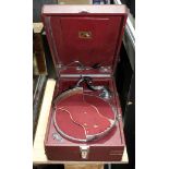 A HMV 102 gramophone in red with 5B sound box.