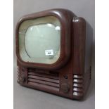 An Art Deco brown bakelite cased Bush radio television receiver, type TV22, height 38cm, width 40cm.