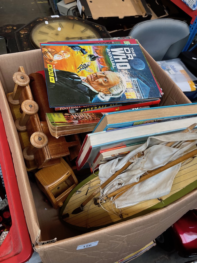 A box of assorted toys including a "Star" pond yacht, assorted wooden model vehicles and assorted
