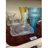 Six pieces of John Walsh iridescent glass comprising a pair of dishes, three vases and four vases,