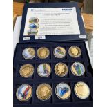 A gold plated coin set 'The celebration of steam locomotives', 12 coins in total.