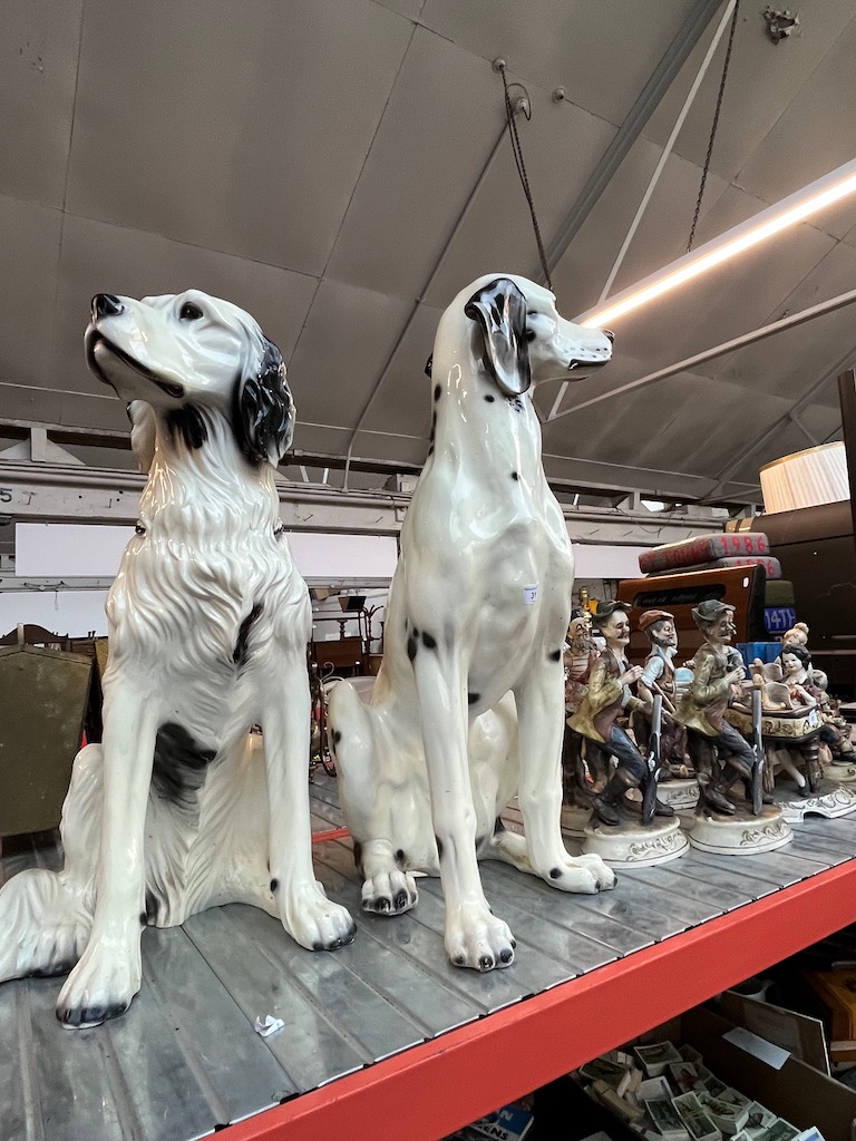 Two large ceramic dogs.