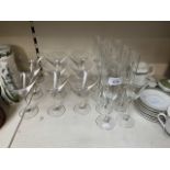 9 crystal martini glasses together with 9 champagne flutes