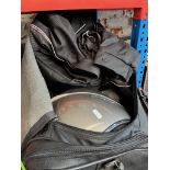 A holdall containing 2 Frank Thomas motorcycle jackets, a Caberg helmet and leather gloves.