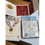 Three coin sets comprising a Commonwealth Games 1986 £2 coin, a Philippines 1992 coin set and a 1978