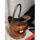 A copper coal bucket and a cased set of 6 spoons.