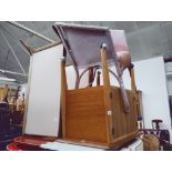 A Lloyd Loom bedroom chair, a side cabinet and a retro trolley.