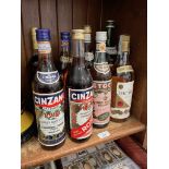 Ten bottles of alcoholic beverages including Baccardi, Cinzano, Rom, Martini etc