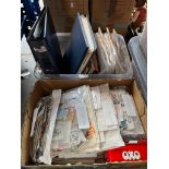 Two boxes containing a collection of UK and world stamps, stamp albums and catalogues.