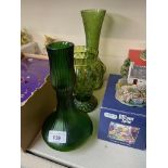 A group of three Kralik irridescent green glass vases, tallest 25cm.