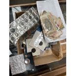 A box of world coins, banknotes and tokens etc.