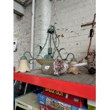 A vintage 3 branch ceiling light fitting and an industrial style lamp.