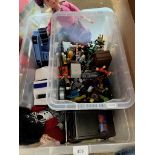 A box of various toys and dolls together with a box of Roadblock figures etc.