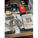 A tub containing plated dressing table set and another, silver plated photo frame, boxed silver