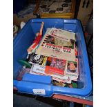 A box of Manchester United memorabilia to include tickets, programmes, calendars, figures and