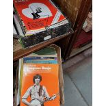 Two boxes of vintage music books and sheet music, banjo, piano etc.