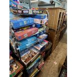 A large quantity of jigsaws and games.