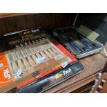 Three sets of wood carving chisels