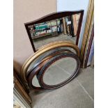 Three oval mirrors and a rectangular one