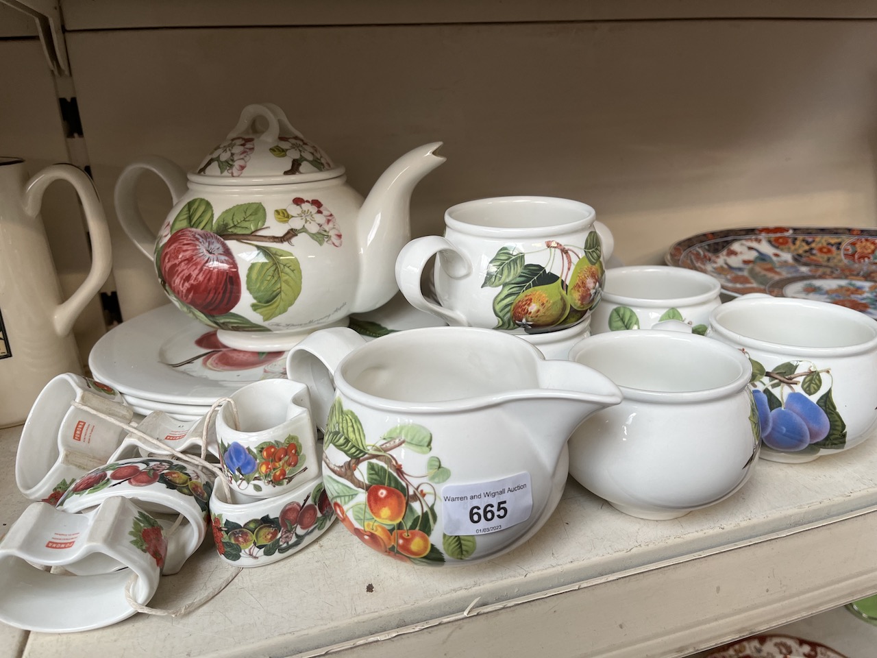 A Port Meirion Pomona tea set, comprising six cups and saucers, six plates, six serviette rings, tea