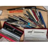 A box of mixed pens to include Parker and Sheaffer.