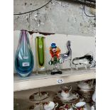 A group of Murano glass ornaments comprising a Sommerso vase, a blue vase, a clown and two