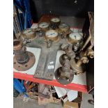 A large heavy metal plate with 6 pressure / vacuum gauges, various makers.