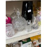 A Caithness glass vase, a large black glass vase, various pieces of crystal including lidded bon bon