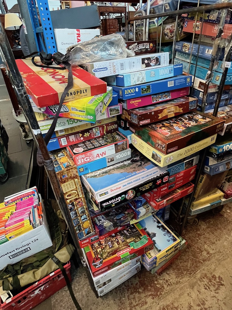A large quantity of jigsaws and games.