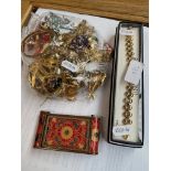 A collection of costume jewellery, silver charms, compact etc.