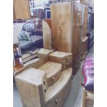 A 1930s Art Deco walnut dressing table together with a matching gentleman's wardrobe with fitted