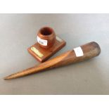 A matchstriker by Lister, of teak from H.M.S. Snapdragon together with an old sailmakers fid.