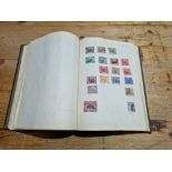 An album of Commonwealth and world stamps, 19th century and later.